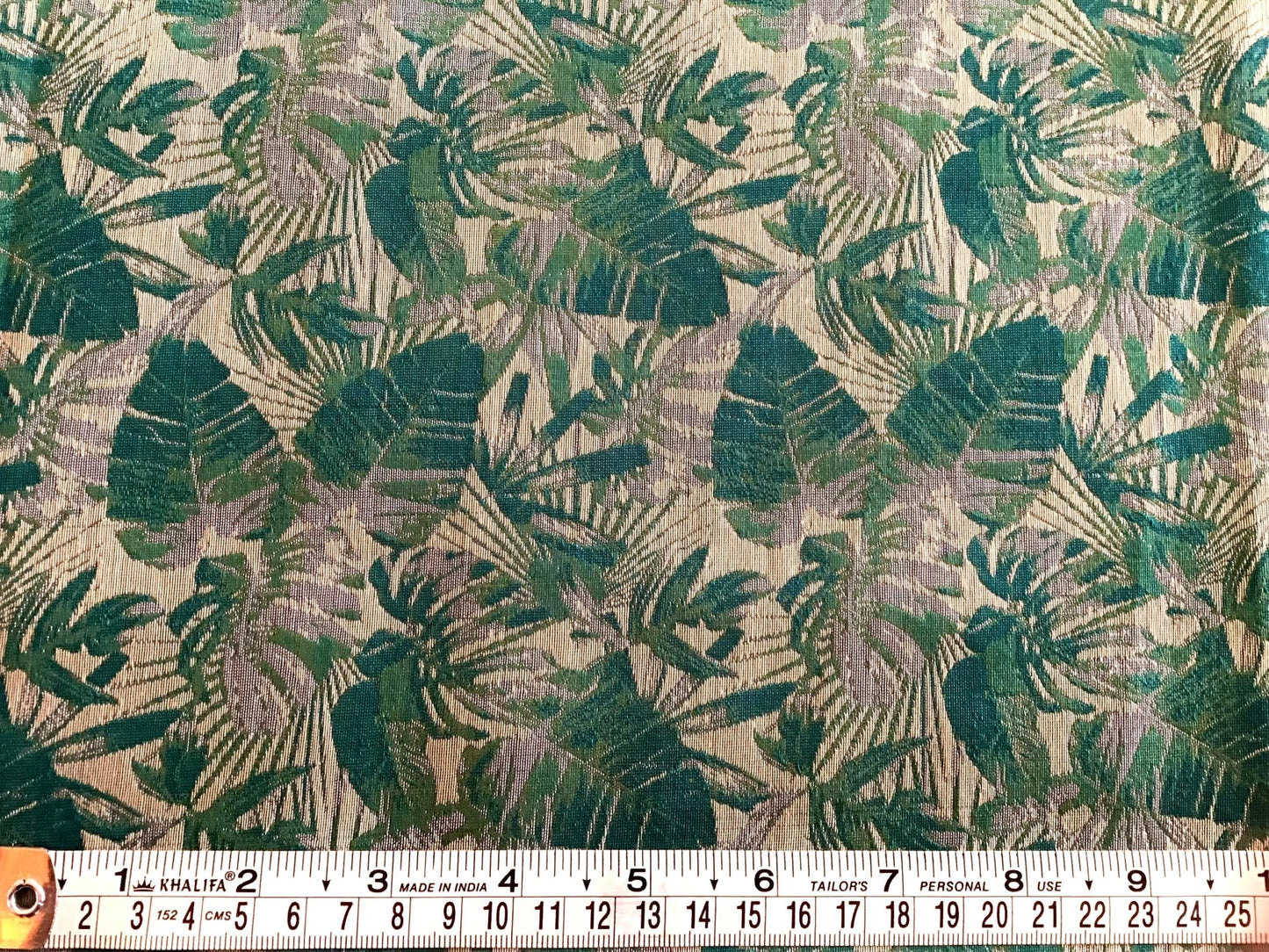 The beauty of leaves print oversewn as jaquard fabric - Violet Elizabeth - Haberdashery